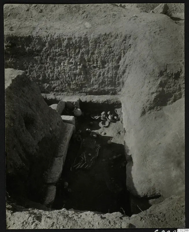 Tomb 11 at Amathus with human bones and pottery vessels in situ in the chamber