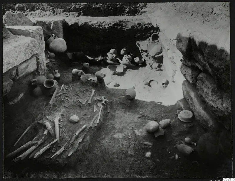 Tomb 11 at Amathus: find layer with a skeleton and pottery vessels, seen from the north.
