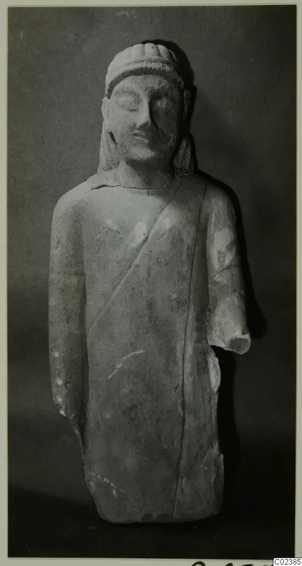 Limestone statue of a standing figure in a long garment, from Kition