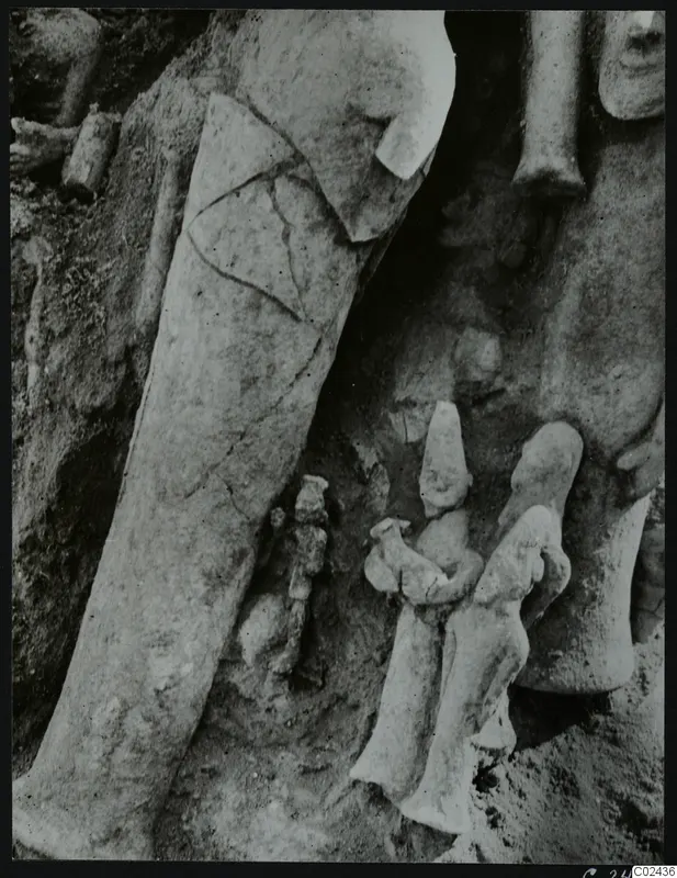 In-situ find of figures and fragments in soil during excavation at Ayia Irini