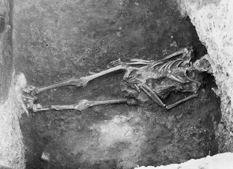 Skeleton lying extended in an earth tomb at Enkomi