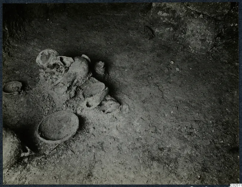 Tomb 13 at Enkomi during excavation, with vessels lying in the tomb chamber floor