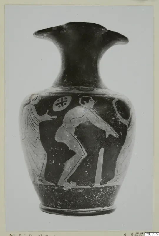 Pottery jug with a trefoil mouth, its dark body painted with pale figures of a bending man and a winged figure