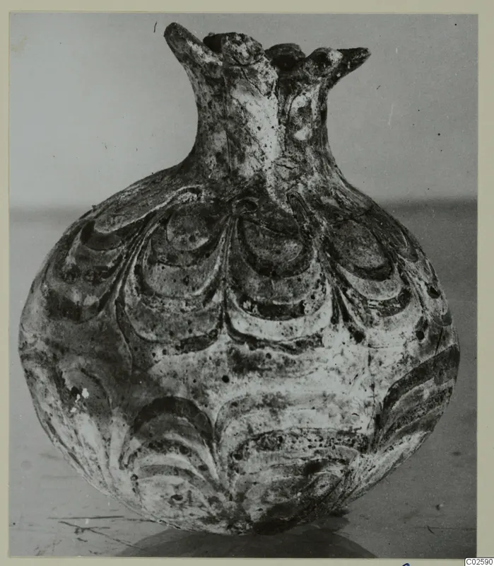 Round vessel with a short flared neck, lobed rim projections and overlapping curved bands of decoration on the body