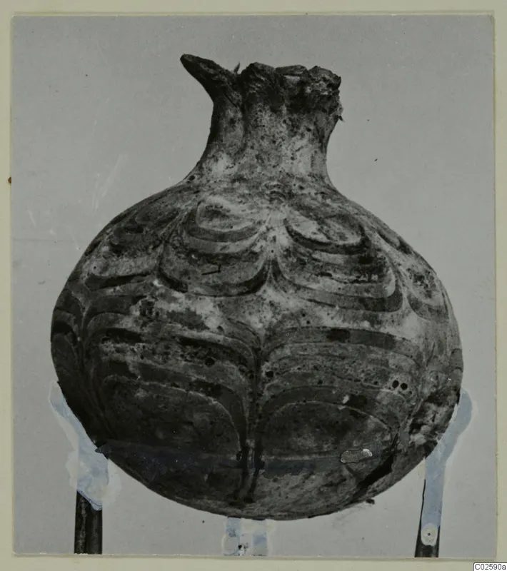 Rounded vessel with a narrow neck and symmetrical curved painted bands, photographed from Enkomi.