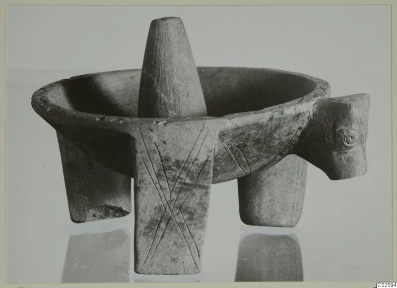 Bowl on three legs with a tall conical post at its centre and an animal head at one side, from Enkomi
