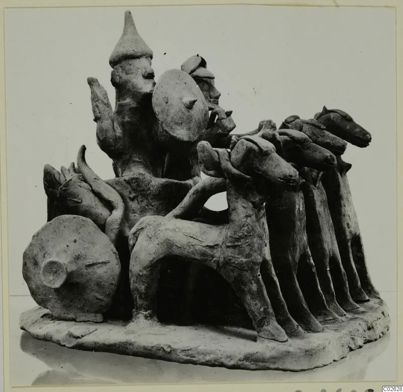 Terracotta group of a horse-drawn vehicle with two standing figures, one holding a round shield