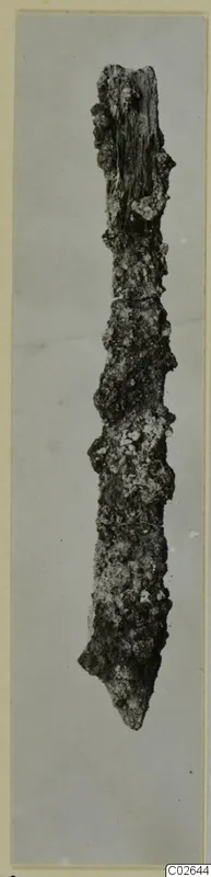 Corroded iron tool with a pointed lower end, from Marion