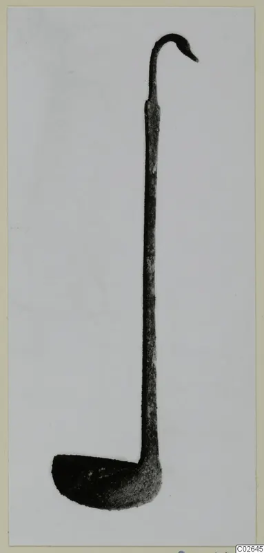 Long-handled metal ladle with a hooked, bird-head-shaped end and a shallow bowl, photographed against a plain grey background.