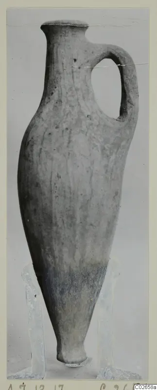Pottery White Shaved Ware vessel with a tall neck and single loop handle, from Ayios Iakovos
