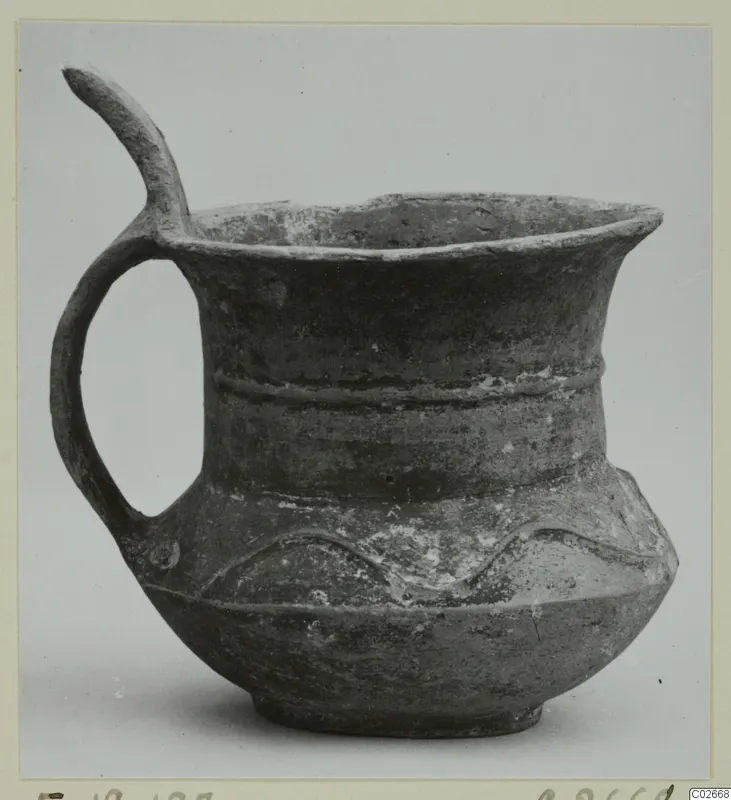 Pottery Base-Ring Ware jug from Enkomi, with a wide mouth and a handle rising above the rim