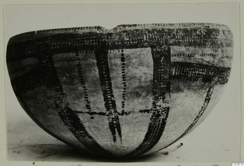 Deep bowl with dark painted bands and dotted decoration, from Ayios Iakovos