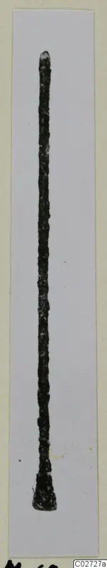 Long bronze pin with a pointed top and flattened base, from Marion