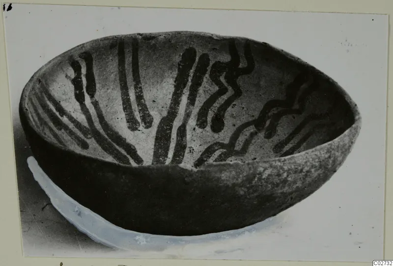 Pottery Red-on-Black bowl from Ayios Iakovos, with painted bands and zigzags on the interior