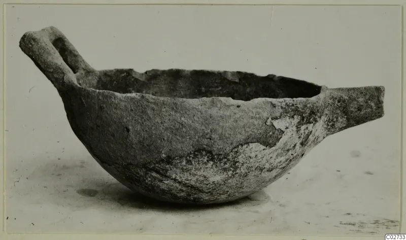 Pottery bowl with a loop handle on one side and a short projecting lip on the other, from Ayios Iakovos
