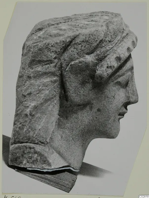 Limestone head from Kition in profile facing right, with a wide band over the hair