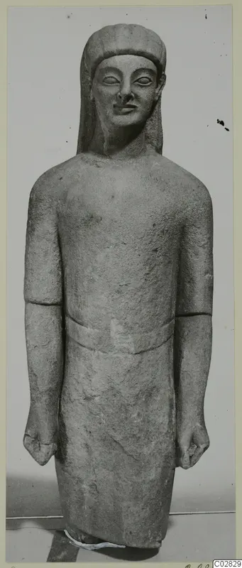 Standing limestone statue from Kition, figure with arms straight at its sides and fists clenched