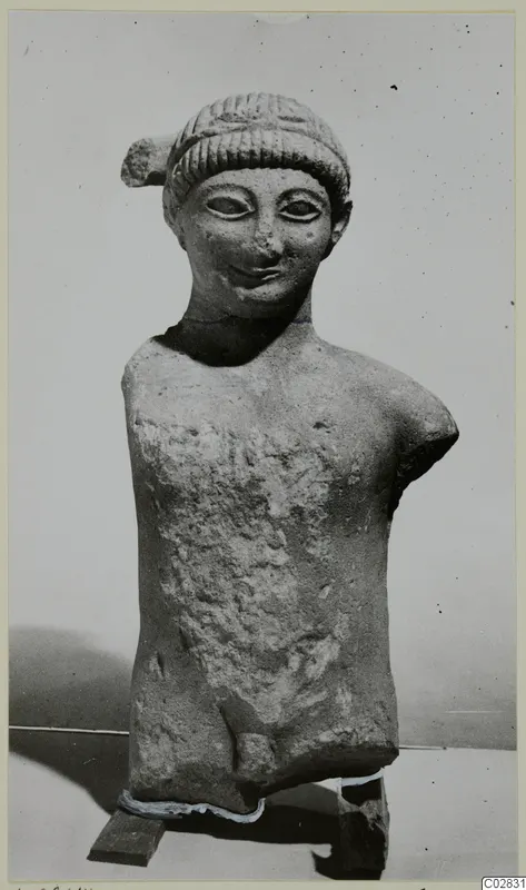 Limestone statue of a male figure from Kition, head and upper body, arms and legs broken off
