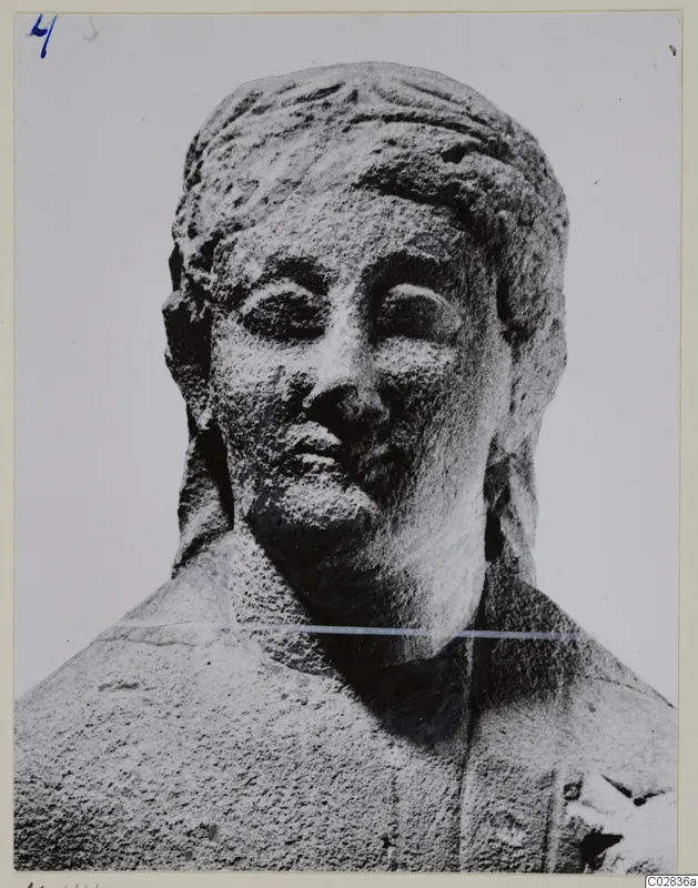 Limestone sculpture of a head and upper shoulders from Kition, in close view
