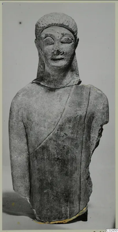 Limestone sculpture from Kition, a bust of a figure with a close-fitting head covering and a draped garment