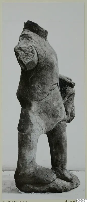 Headless limestone statue of a standing figure from Kition, seen from the side