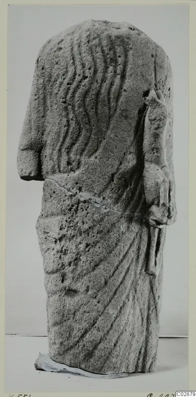 Limestone Cypro-Greek II statuette, headless figure with wavy lines carved down the back
