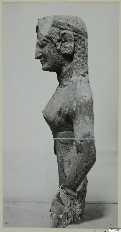 Limestone statue of a female figure in side profile from Kition, arms at her sides, with a broken base