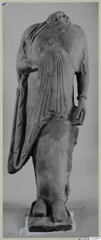 Headless limestone statue of a draped standing figure from Kition