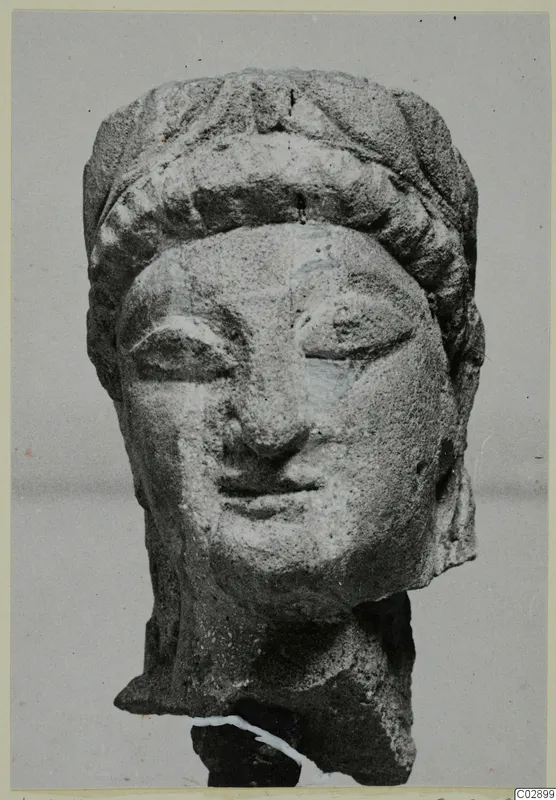 Limestone Cypro-Greek II statuette head from Kition, broken off at the neck