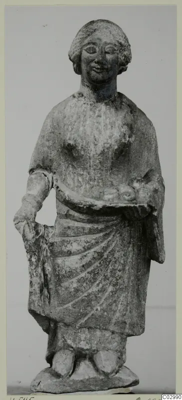 Limestone statuette of a standing figure holding a dish, from Vouni