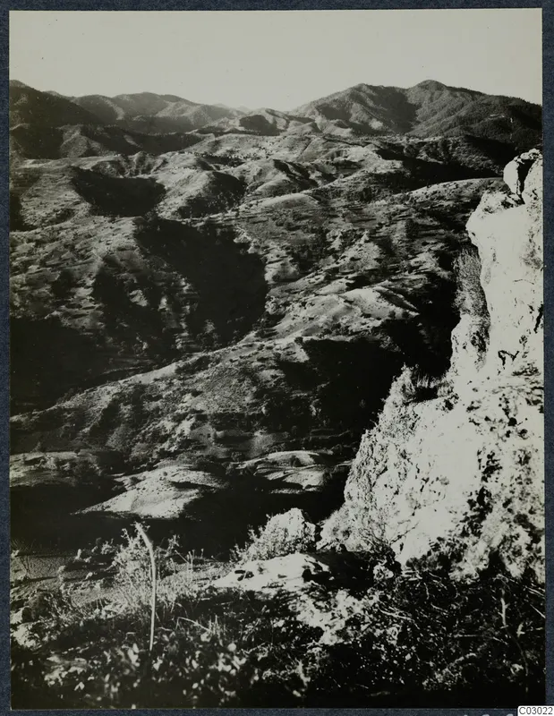 View from a mountain at Vouni towards Galini, with hills and terraced slopes falling away below