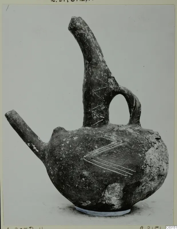 Red Polished III jug from Lapithos with incised chevron decoration
