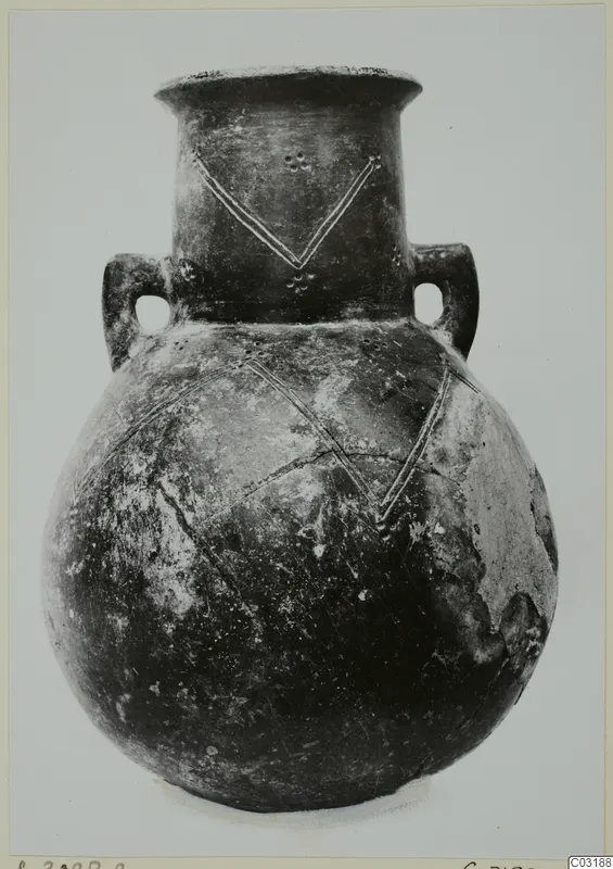 Amphora from Lapithos with two loop handles and incised V-shaped lines with dots on neck and shoulder