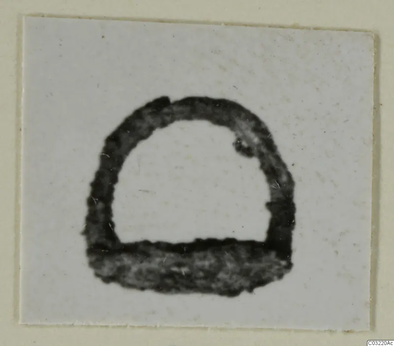 Ring from Marion, shown as a thick dark arch-shaped outline on a pale card.