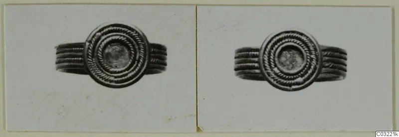 Two photographs of the same ring with a round head of concentric twisted bands, from Ayios Iakovos