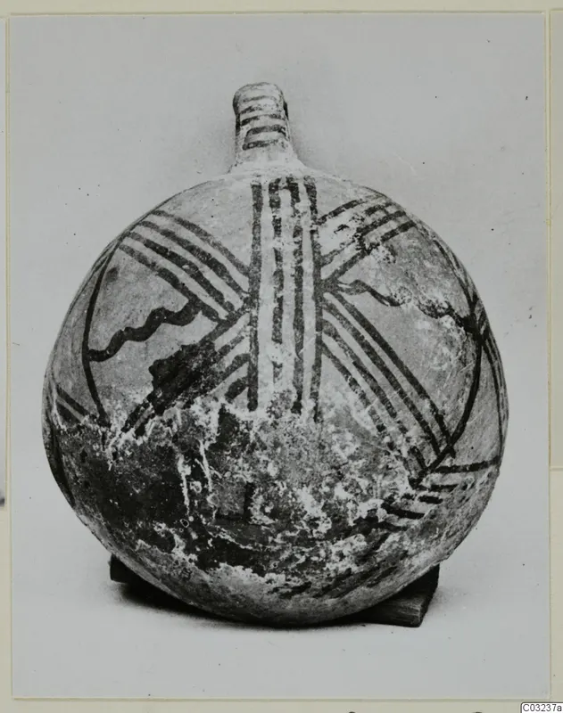 Round-bodied painted pottery vessel with a short neck, decorated with dark bands, standing on a small wooden block.