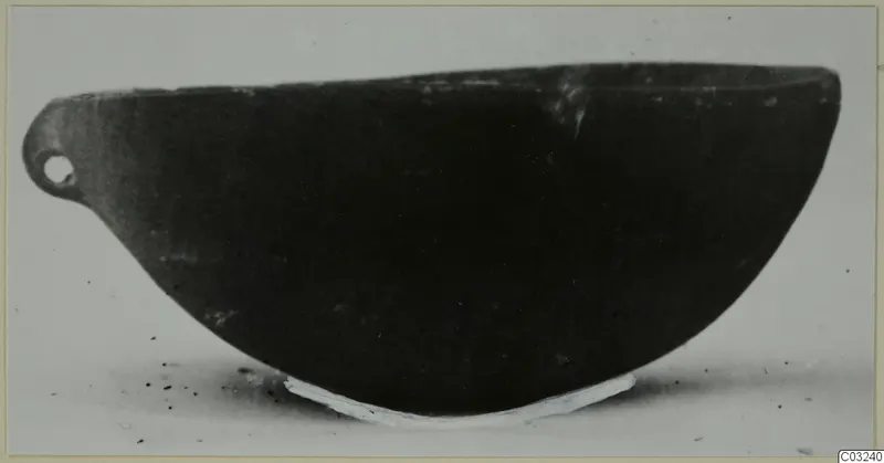 Pottery Red Polished III Bowl from Lapithos, side view, with a pierced lug handle at the left