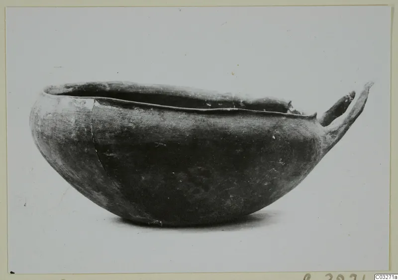 Pottery Monochrome Ware bowl with a single handle, from Milia