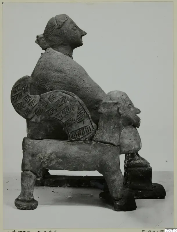 Terracotta figurine of a seated figure with a bearded head and an incised panel, Terracotta Minor Plastic 3 from Ayia Irini