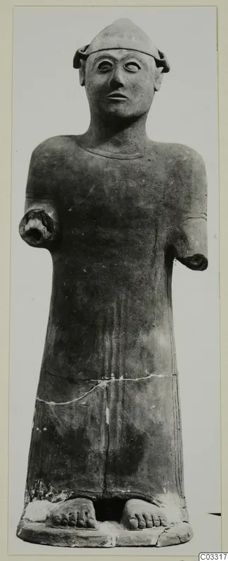 Terracotta standing figure with a close-fitting cap, large eyes and stump arms, Terracotta Proto-Cypriote II