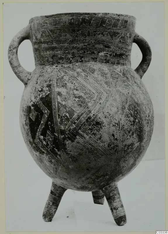 Red Polished II amphora from Lapithos: two-handled vessel on three feet with incised bands and chevron decoration