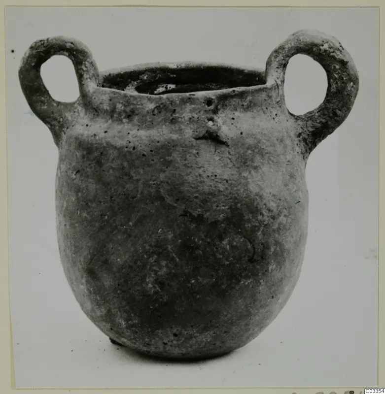 Red Polished III jug with two loop handles.
