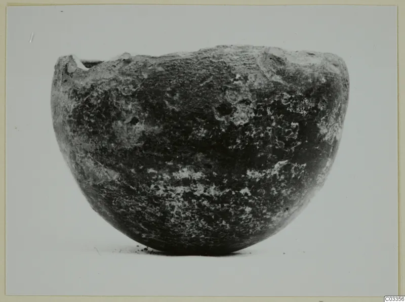 Pottery Red Polished I bowl from the Vrysi tou Barba tombs at Lapithos, shown in side view