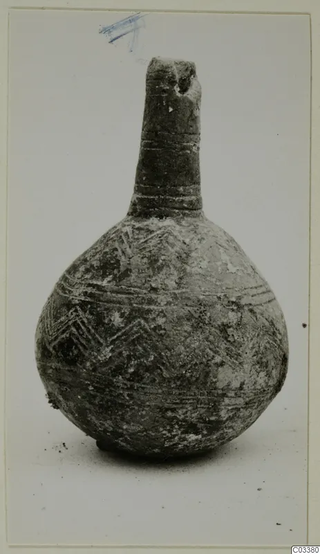 Black Polished pottery vessel with a long narrow neck and zigzag bands, from Lapithos, Vrysi tou Barba tombs