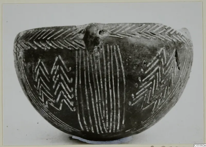 Red Polished III bowl from Lapithos, side view, with incised chevron and vertical line decoration