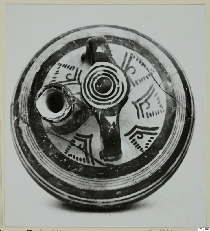 Bowl-jar of Levanto-Helladic Ware seen from above, with a spout, a loop handle and dark painted bands and motifs