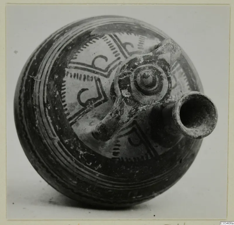 Levanto-Helladic Ware bowl-jar from Enkomi with a spout and a strap handle decorated with a spiral