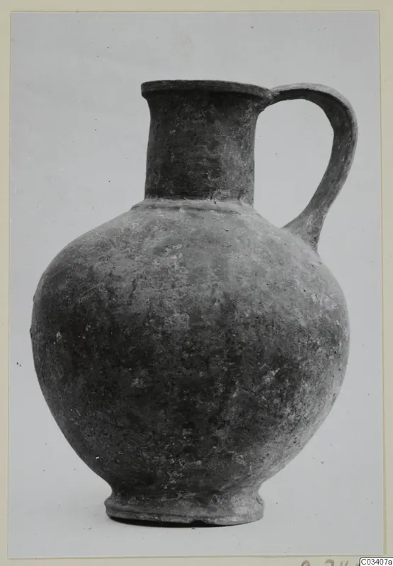 Pottery Base-Ring Ware jug from Enkomi with a globular body, tall neck and single loop handle
