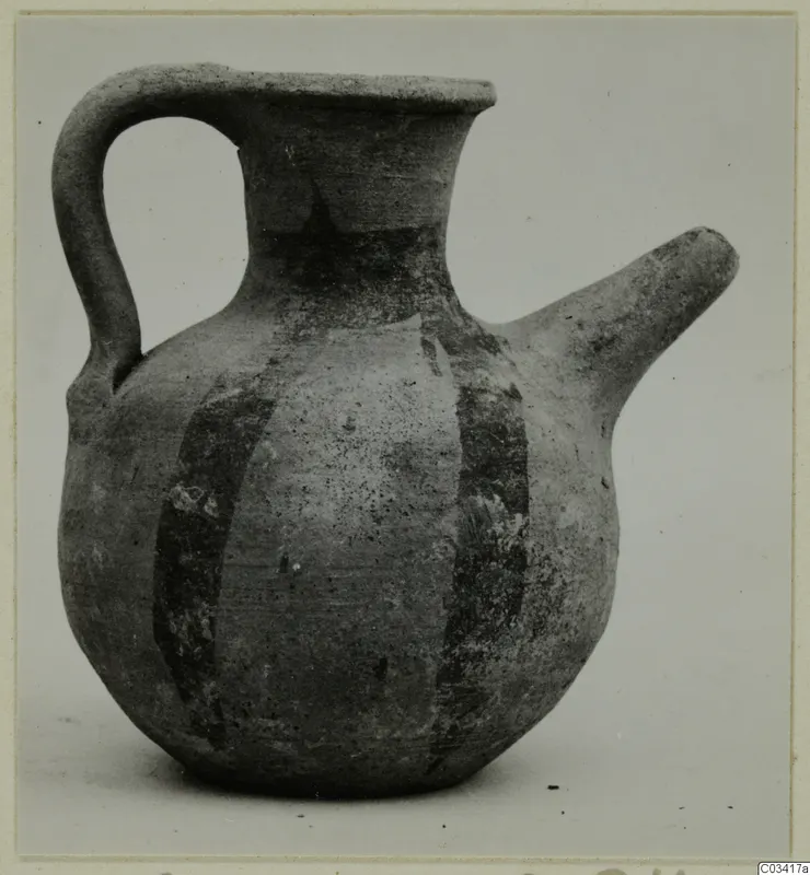 Pottery jug with a loop handle, side spout and dark painted bands on the body, from Enkomi