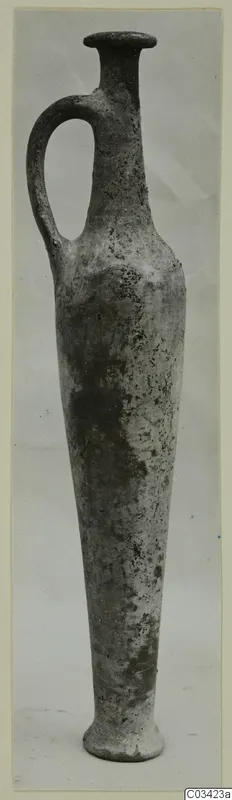 Pottery Red Lustrous Ware vessel from Enkomi, tall narrow body with a single handle